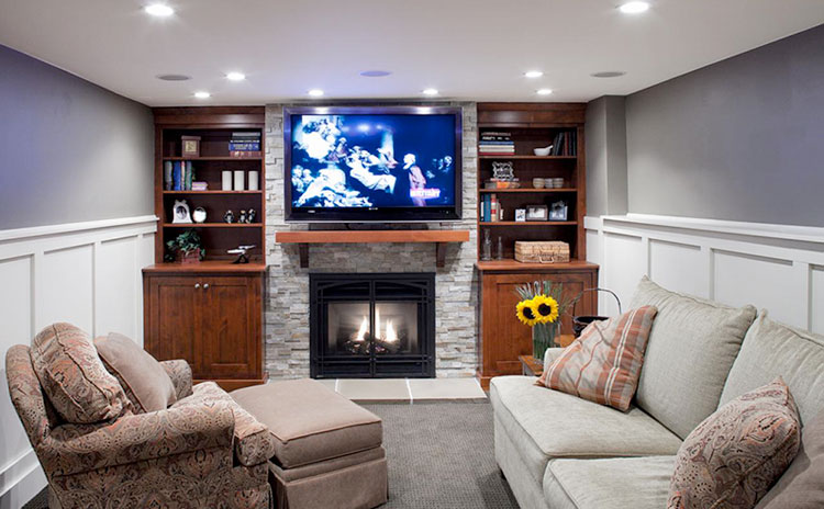 Fireplace with built in shelving units - Basement finishing