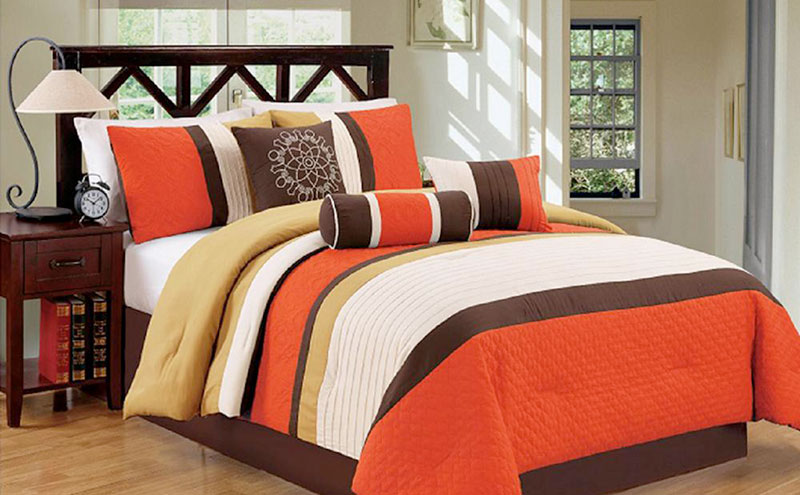 Use deep orange in your bedroom accents to improve your home in the fall