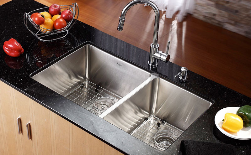 Divided sinks and black granite countertop kitchen remodel