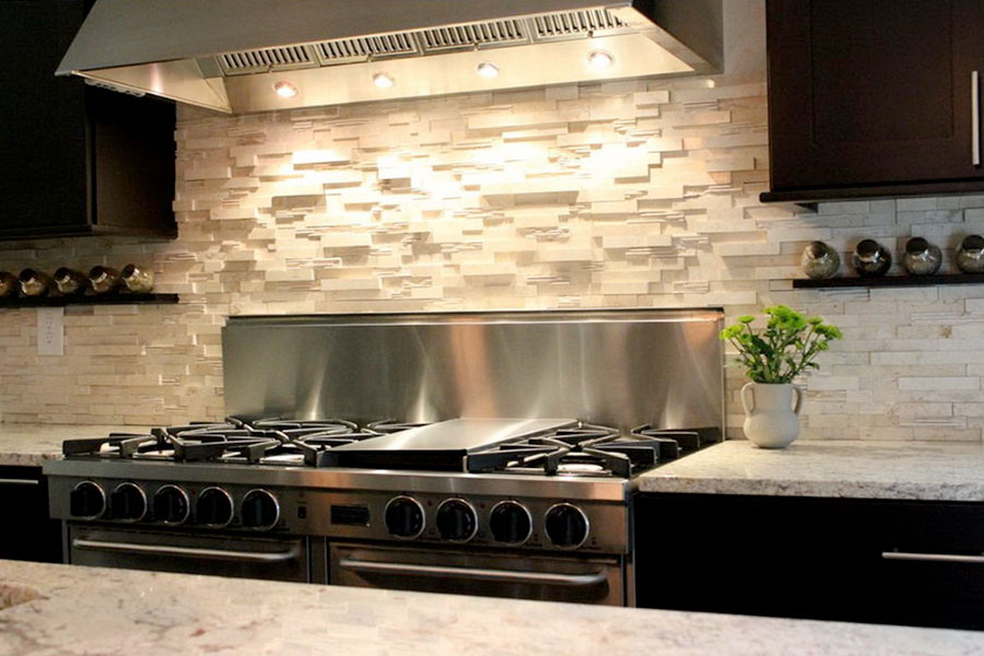 Use stone tiles for your backsplash to give a rustic touch to your kitchen.